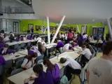 A room full of school pupils at their desks.