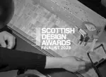 A behind the scenes image of a stop motion animation being made. With a Scottish Design Awards Finalist 2023 logo overlay.